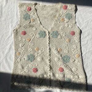 Very detailed crocheted vest would fit a size Large!